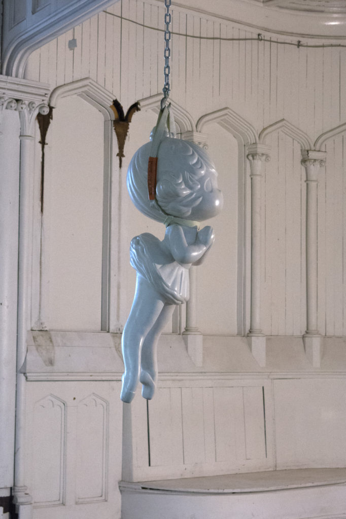 Melanie Vote sculpture: Found, 2011, resin, strap & chain, 20x20x60 in.